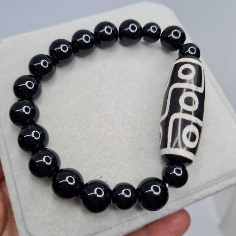 دستبندمردانه سنگ عقیق سیاه و مهره بودایی